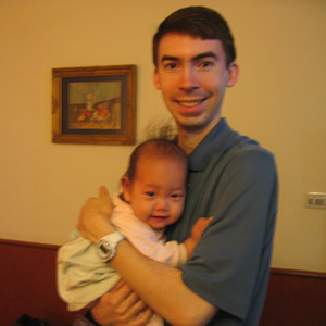 Daddy's first chance to hold his new daughter